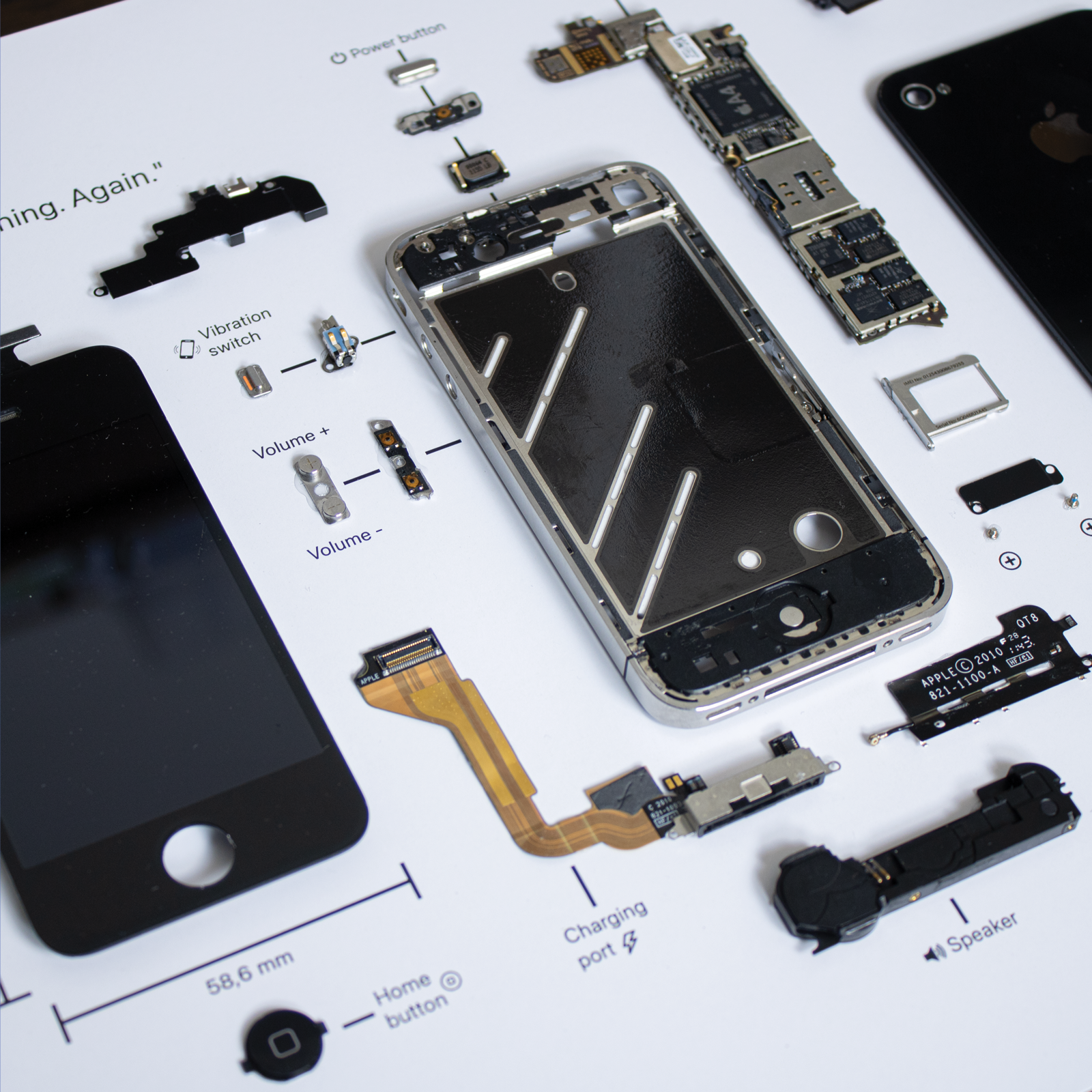 iPhone 4 disassembled in a frame