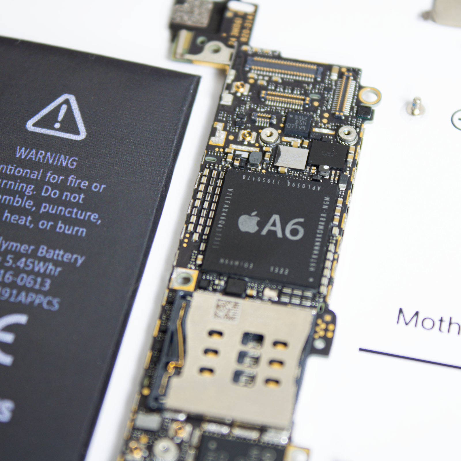 iPhone 5 disassembled in a frame